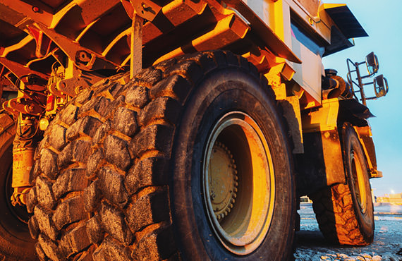 In an effort to reduce operating costs and preserve production levels, fewer and larger ultra-class haul trucks are sent into the pit.